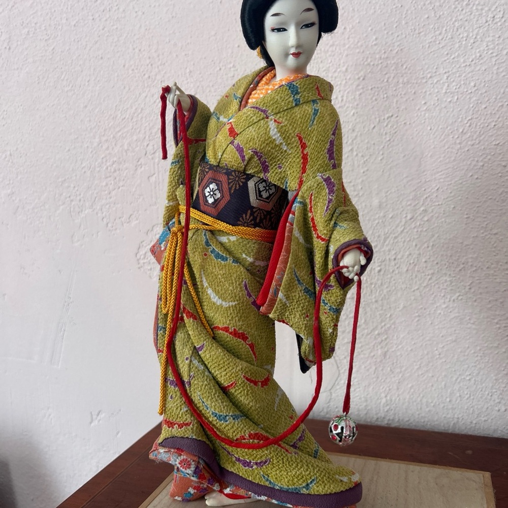 Elegant Kimono-Clad Figurine in Yellow and Multicolor